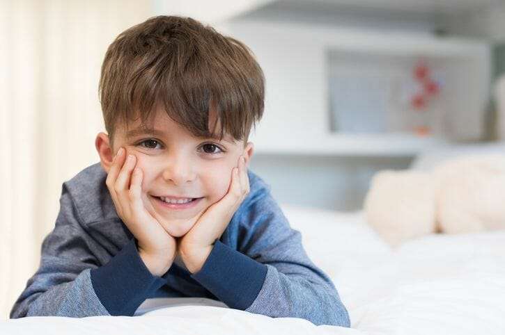 Child Smiling within post about Social Building Blocks program from the YMCA South Hampton Roads