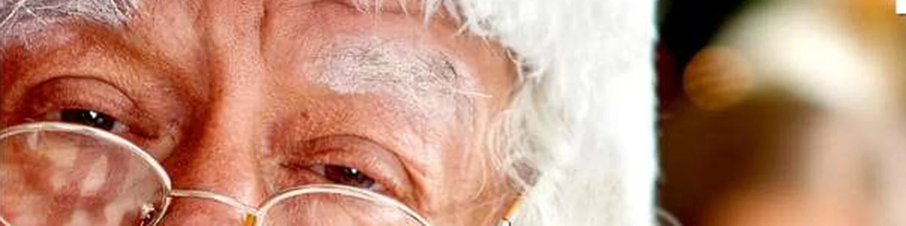 Close-up of Santa Claus with glasses and a white beard